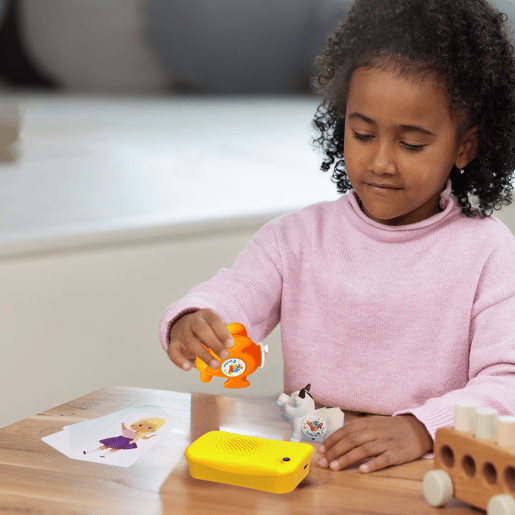 7-yearsold-black-girl-playing-with-Talkido